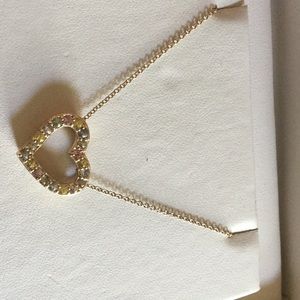 Heart necklace with multi colored gemstones.